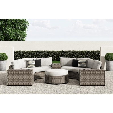 Signature Design by Ashley Calworth P458P5 7 pc Outdoor Sectional with Ottoman